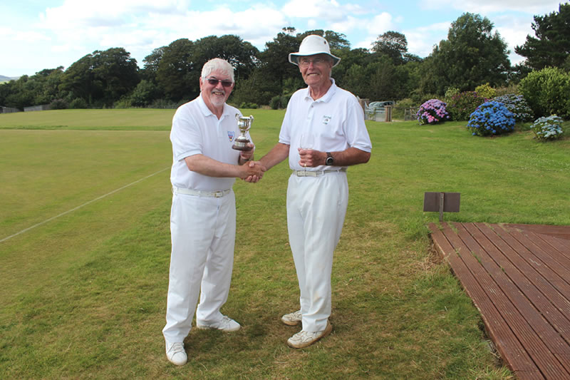 The Winner Tony Backhouse receives The Edwards Cup from The Chairman Des Honey